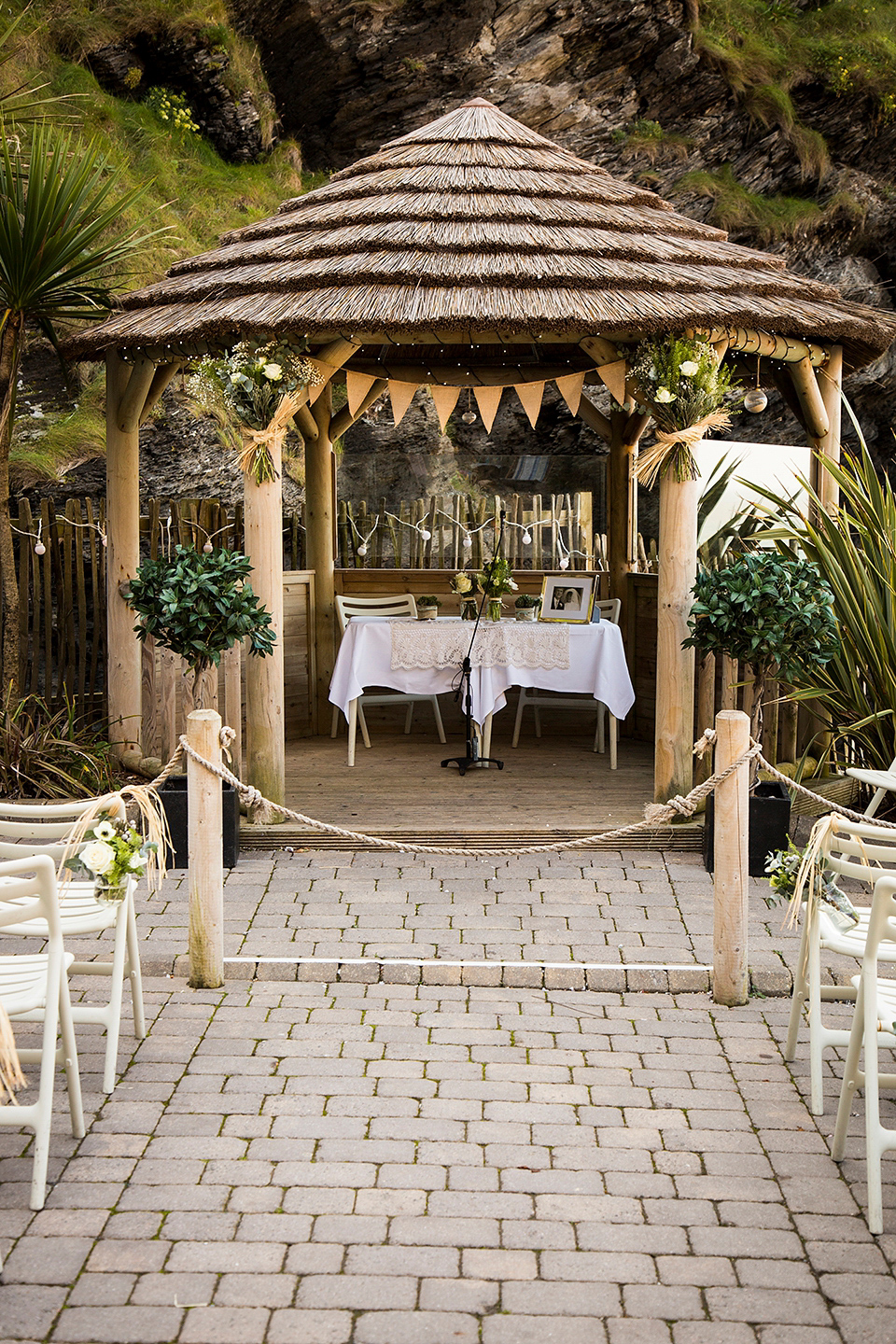 Bride Louisa wears a polka dot gown by Cathrine Deane for her seaside wedding in Devon.