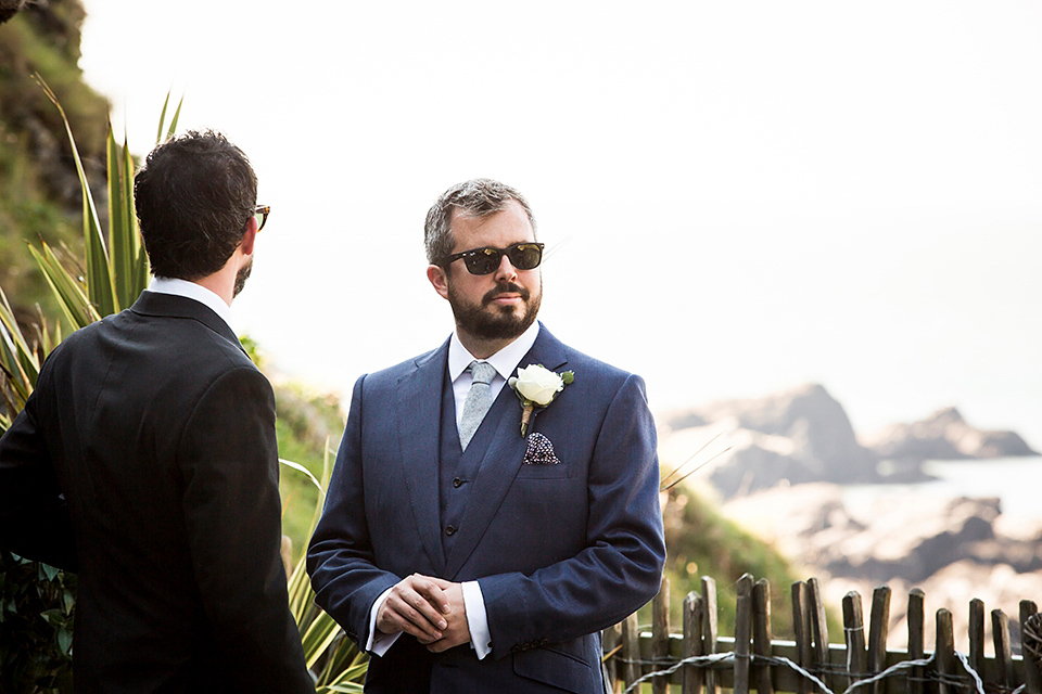 Bride Louisa wears a polka dot gown by Cathrine Deane for her seaside wedding in Devon.