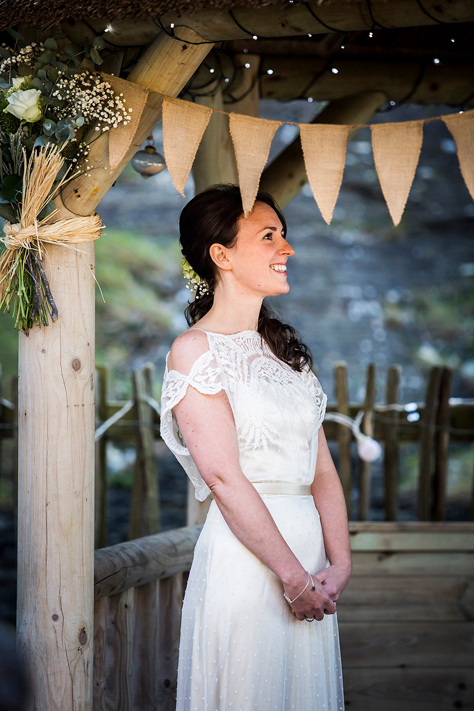 Bride Louisa wears a polka dot gown by Cathrine Deane for her seaside wedding in Devon.