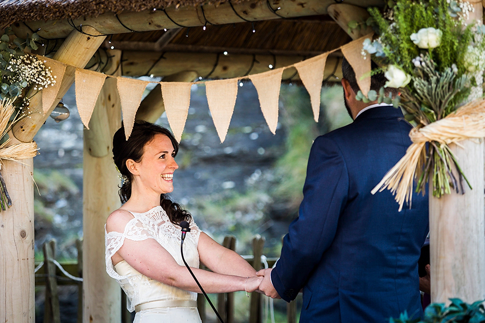 Bride Louisa wears a polka dot gown by Cathrine Deane for her seaside wedding in Devon.