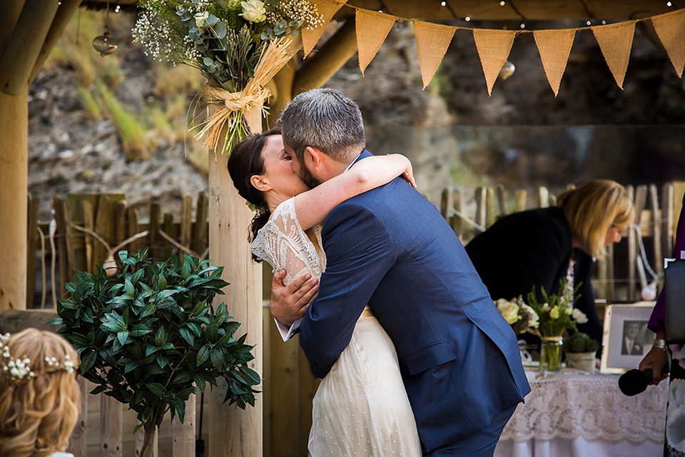 Bride Louisa wears a polka dot gown by Cathrine Deane for her seaside wedding in Devon.