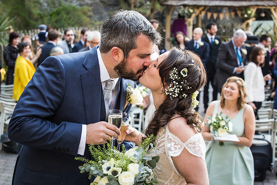 Bride Louisa wears a polka dot gown by Cathrine Deane for her seaside wedding in Devon.