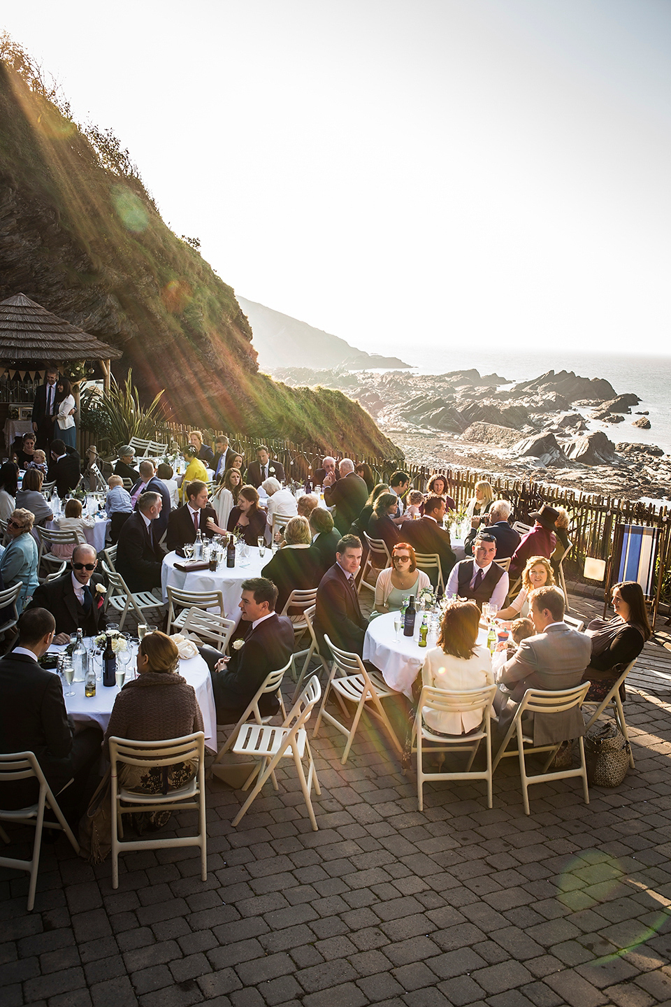 Bride Louisa wears a polka dot gown by Cathrine Deane for her seaside wedding in Devon.