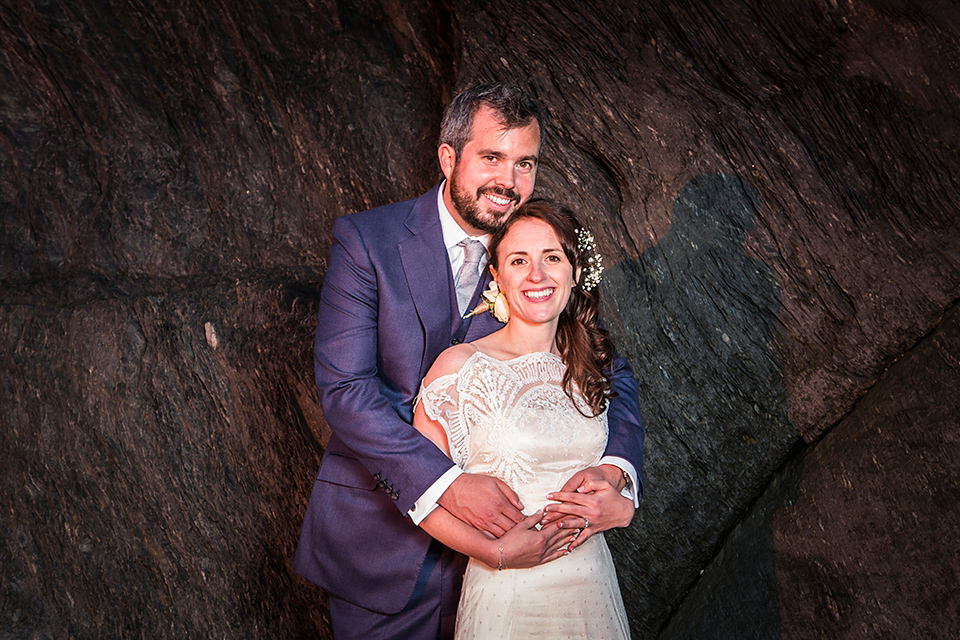 Bride Louisa wears a polka dot gown by Cathrine Deane for her seaside wedding in Devon.