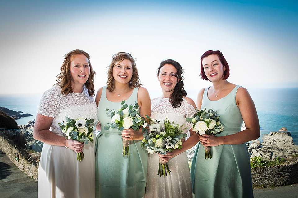 Bride Louisa wears a polka dot gown by Cathrine Deane for her seaside wedding in Devon.