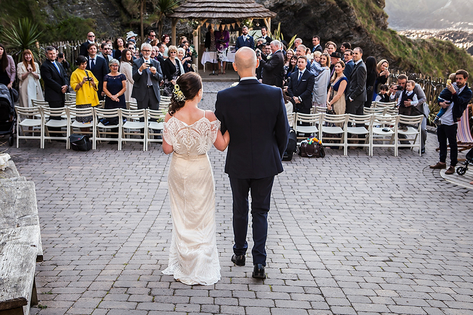 Bride Louisa wears a polka dot gown by Cathrine Deane for her seaside wedding in Devon.