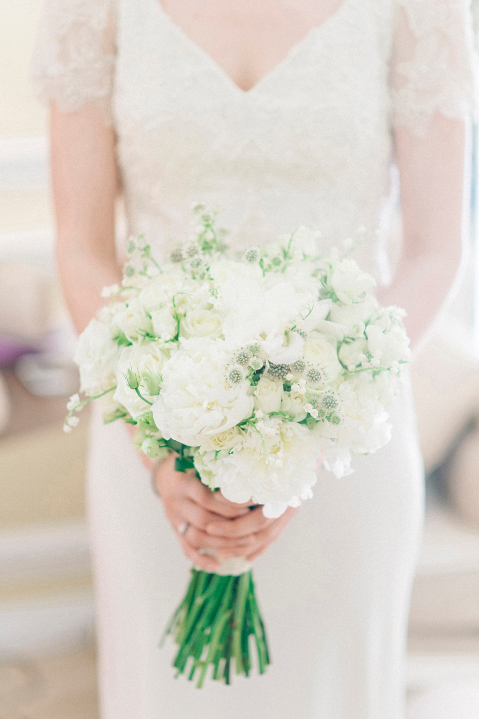 Bride Laura wears an Anoushka G gown for her late Summer wedding at Eshott Hall in Northumberland. Photography by Sarah Jane Ethan.