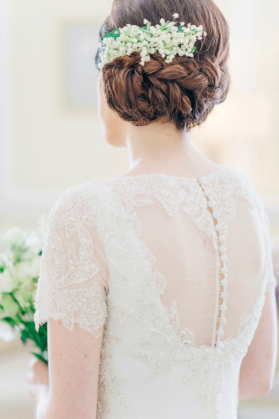 Bride Laura wears an Anoushka G gown for her late Summer wedding at Eshott Hall in Northumberland. Photography by Sarah Jane Ethan.