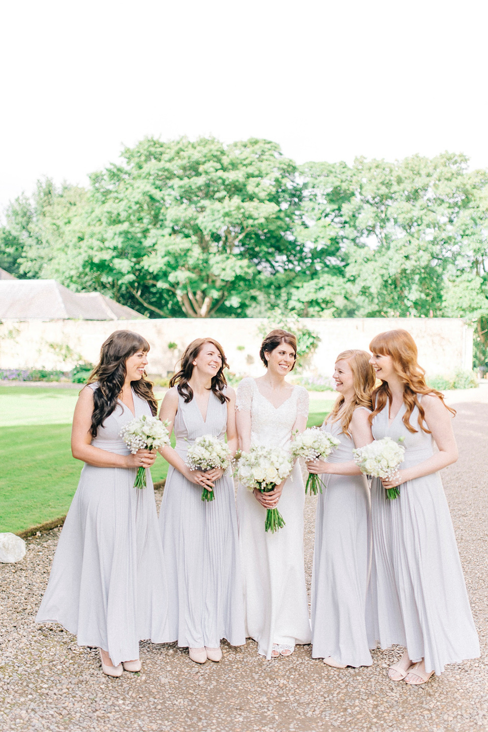 Bride Laura wears an Anoushka G gown for her late Summer wedding at Eshott Hall in Northumberland. Photography by Sarah Jane Ethan.