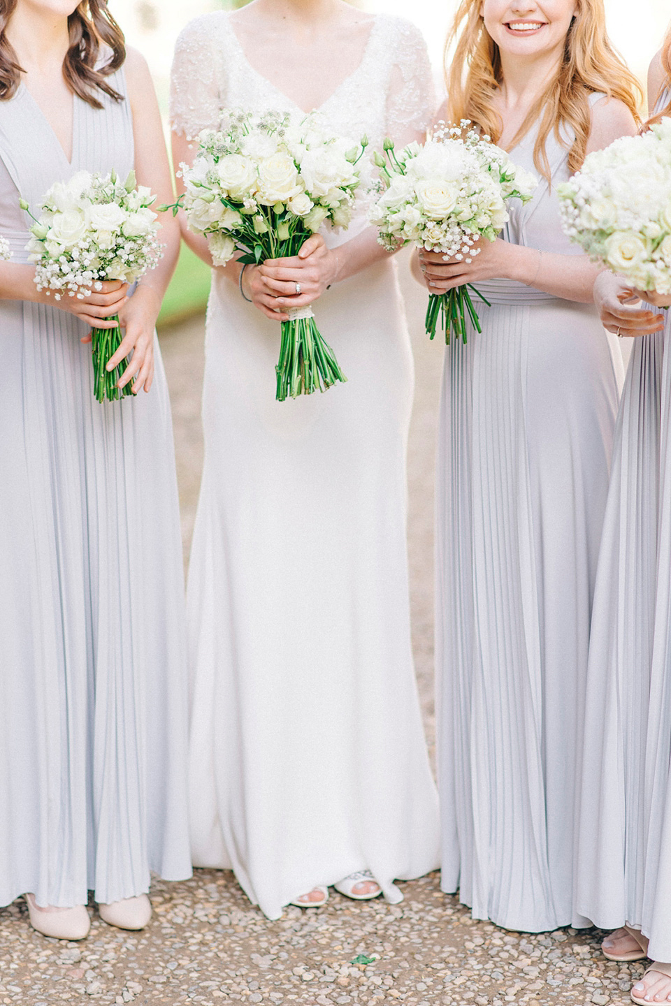 Bride Laura wears an Anoushka G gown for her late Summer wedding at Eshott Hall in Northumberland. Photography by Sarah Jane Ethan.