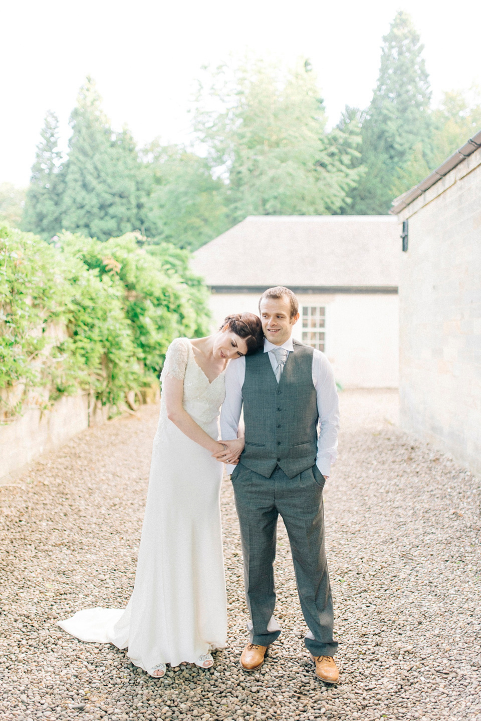 Bride Laura wears an Anoushka G gown for her late Summer wedding at Eshott Hall in Northumberland. Photography by Sarah Jane Ethan.