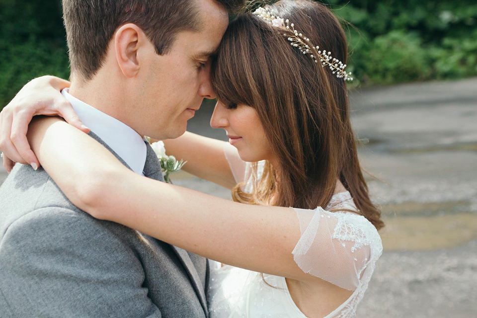 Bride Jenny wore a Rosa Clara wedding dress and a second shorter dress for dancing in at her pale green and botanical inspired wedding. Photography by Mirrorbox.