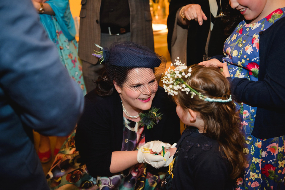 A 1950's vintage dress for a yellow and green Humanist tipi wedding in Scotland. Images by Mack Photo.