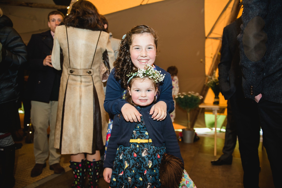 A 1950's vintage dress for a yellow and green Humanist tipi wedding in Scotland. Images by Mack Photo.