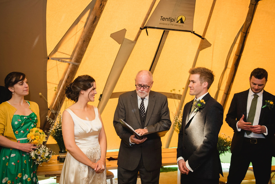 A 1950's vintage dress for a yellow and green Humanist tipi wedding in Scotland. Images by Mack Photo.