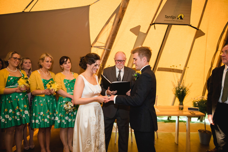 A 1950's vintage dress for a yellow and green Humanist tipi wedding in Scotland. Images by Mack Photo.