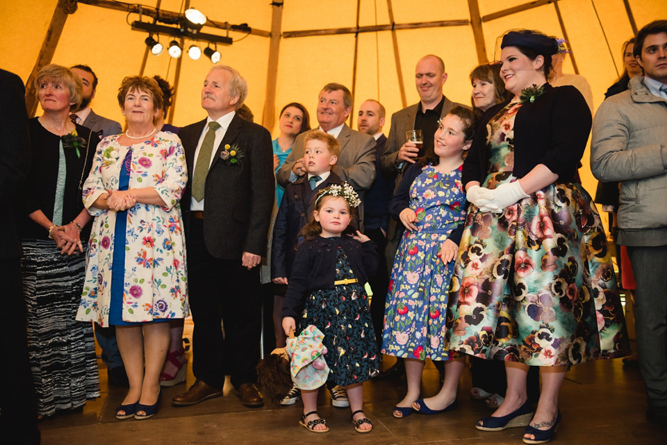 A 1950's vintage dress for a yellow and green Humanist tipi wedding in Scotland. Images by Mack Photo.