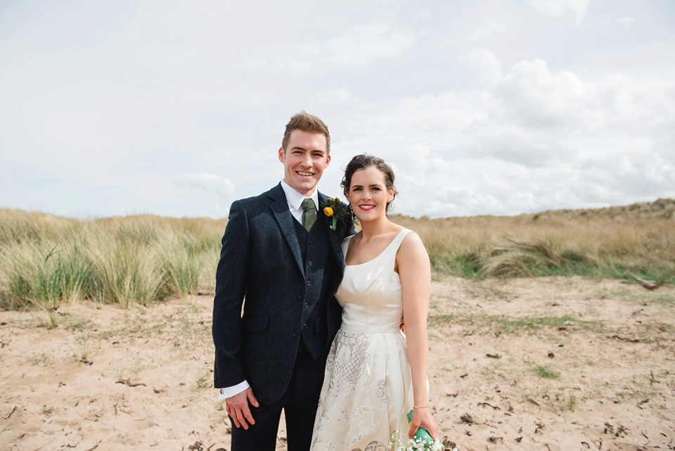 A 1950's vintage dress for a yellow and green Humanist tipi wedding in Scotland. Images by Mack Photo.