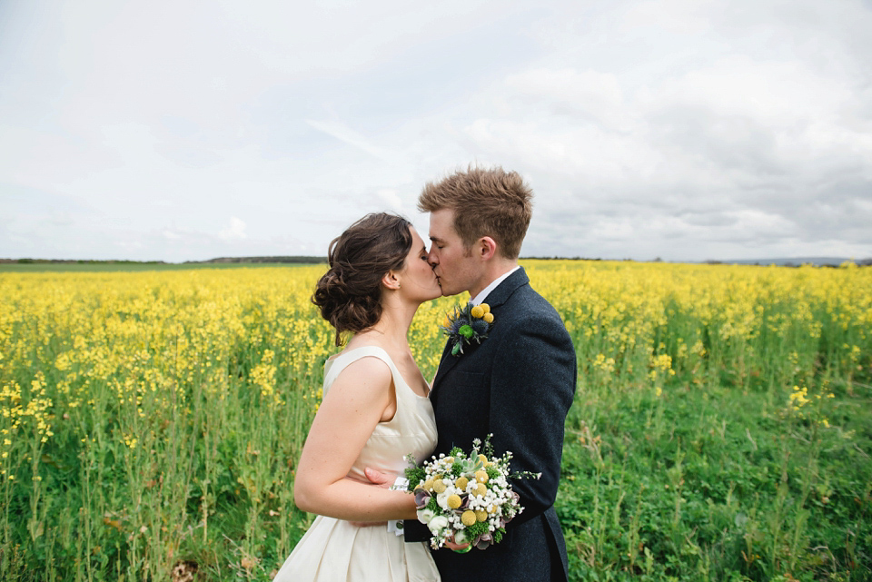 A 1950's vintage dress for a yellow and green Humanist tipi wedding in Scotland. Images by Mack Photo.