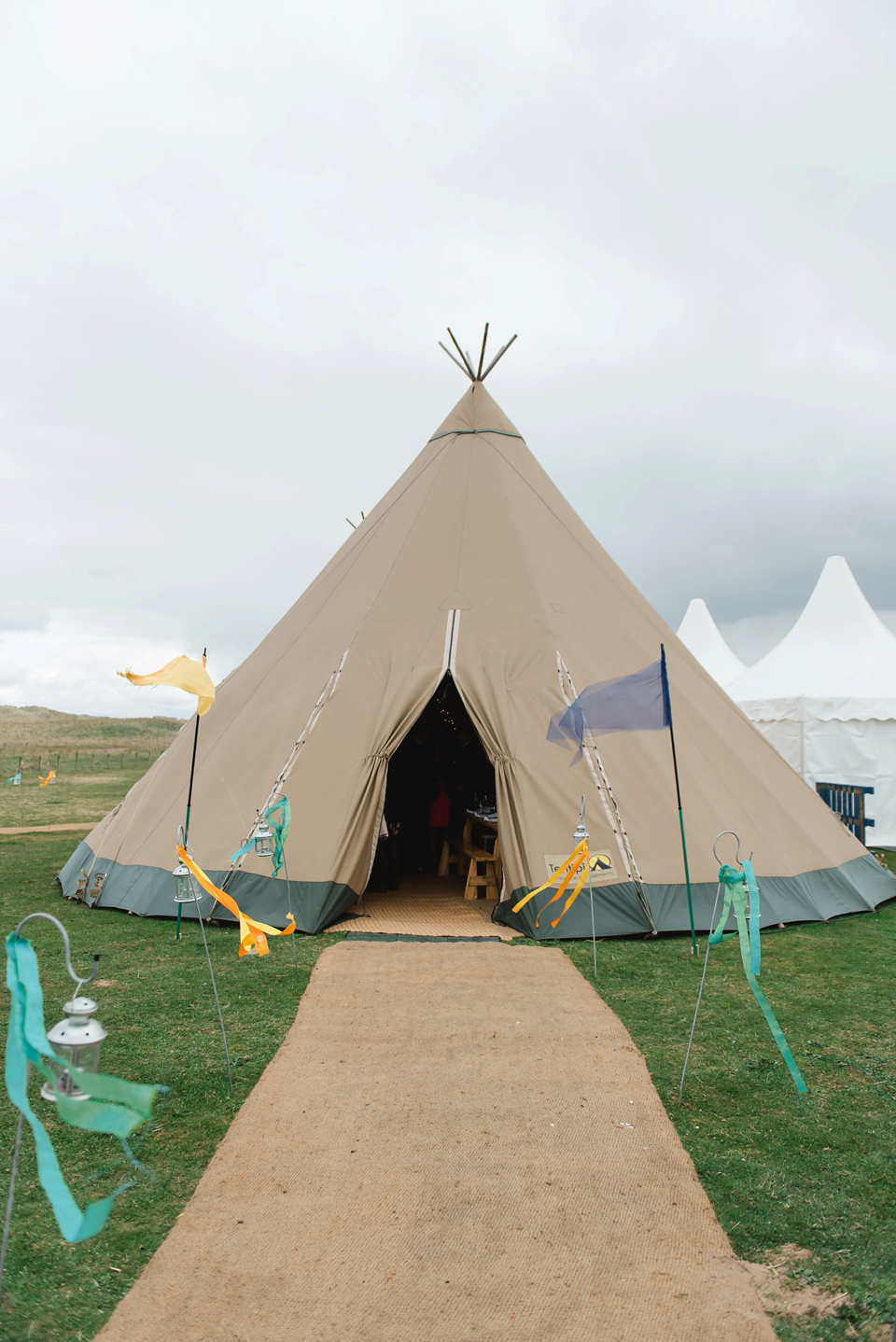 A 1950's vintage dress for a yellow and green Humanist tipi wedding in Scotland. Images by Mack Photo.