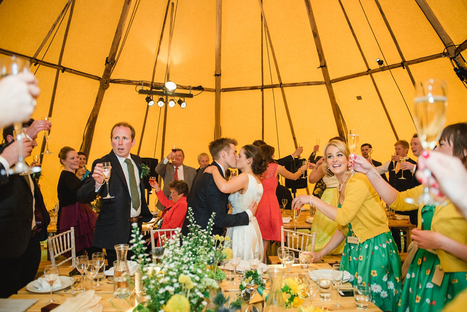 A 1950's vintage dress for a yellow and green Humanist tipi wedding in Scotland. Images by Mack Photo.