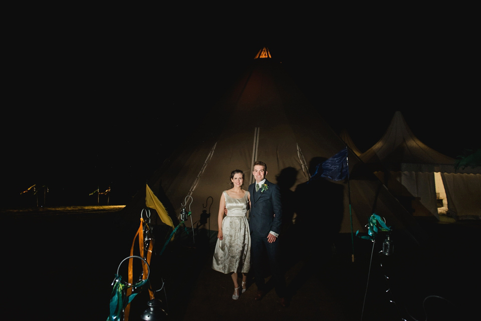 A 1950's vintage dress for a yellow and green Humanist tipi wedding in Scotland. Images by Mack Photo.