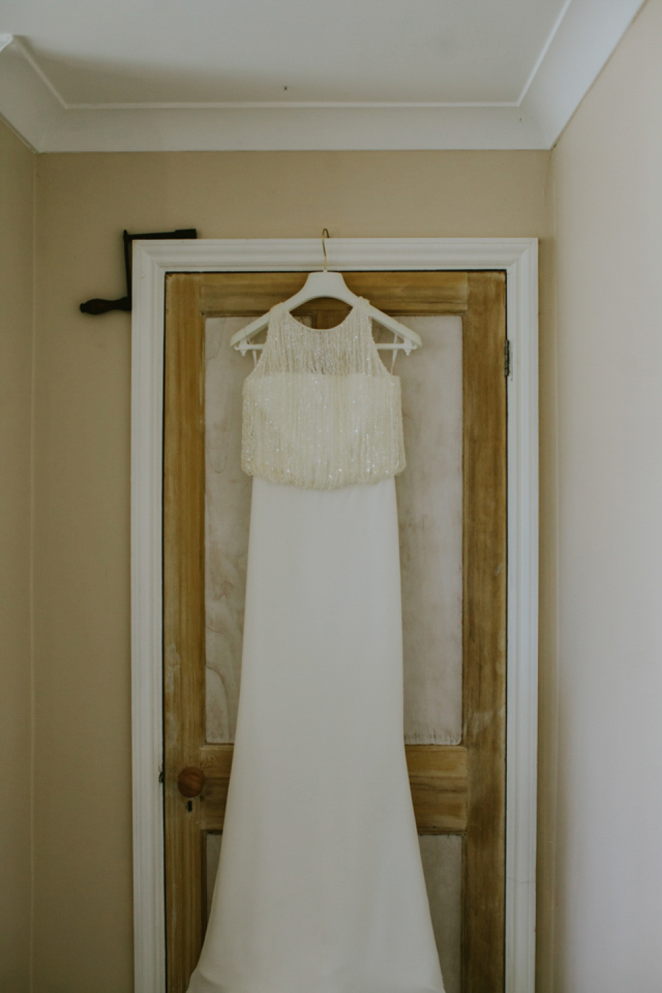 Alex wears a Pronovias gown for her English country barn wedding. Photography by Craig and Kate.