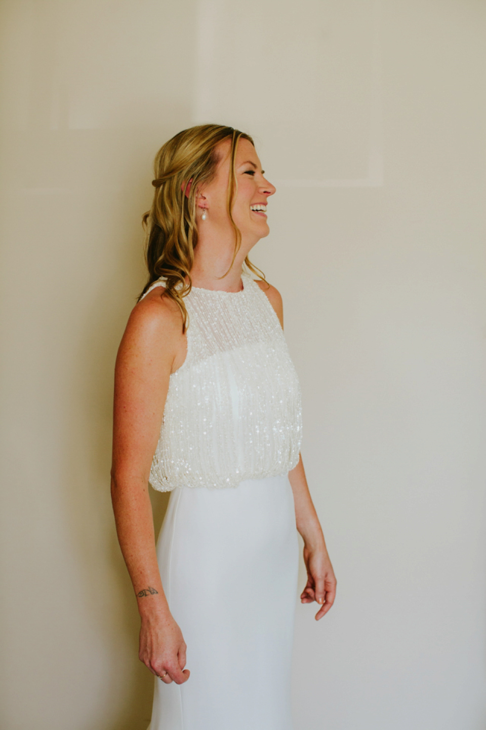 Alex wears a Pronovias gown for her English country barn wedding. Photography by Craig and Kate.