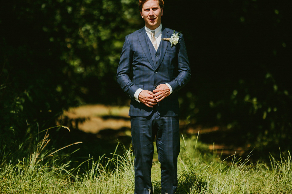 Alex wears a Pronovias gown for her English country barn wedding. Photography by Craig and Kate.