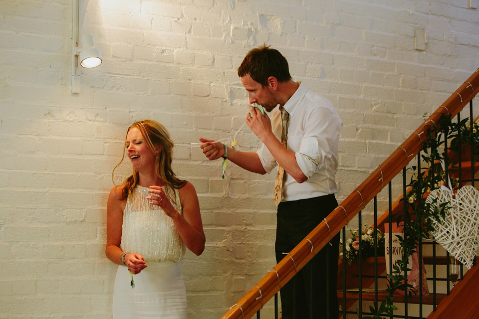 Alex wears a Pronovias gown for her English country barn wedding. Photography by Craig and Kate.