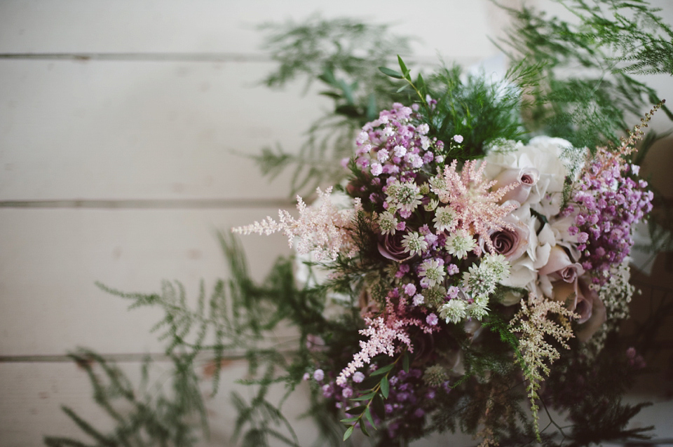 A joy filled barn wedding in shades of gold and pink, with a beautiful bride in a Stella York gown. Images by Mustard Yellow Photography.