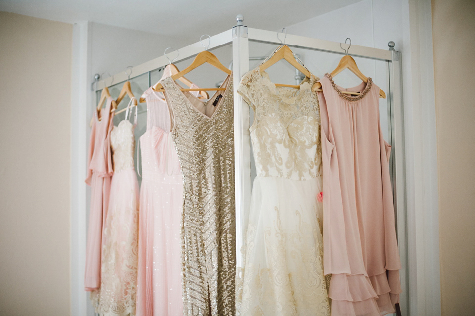 A joy filled barn wedding in shades of gold and pink, with a beautiful bride in a Stella York gown. Images by Mustard Yellow Photography.