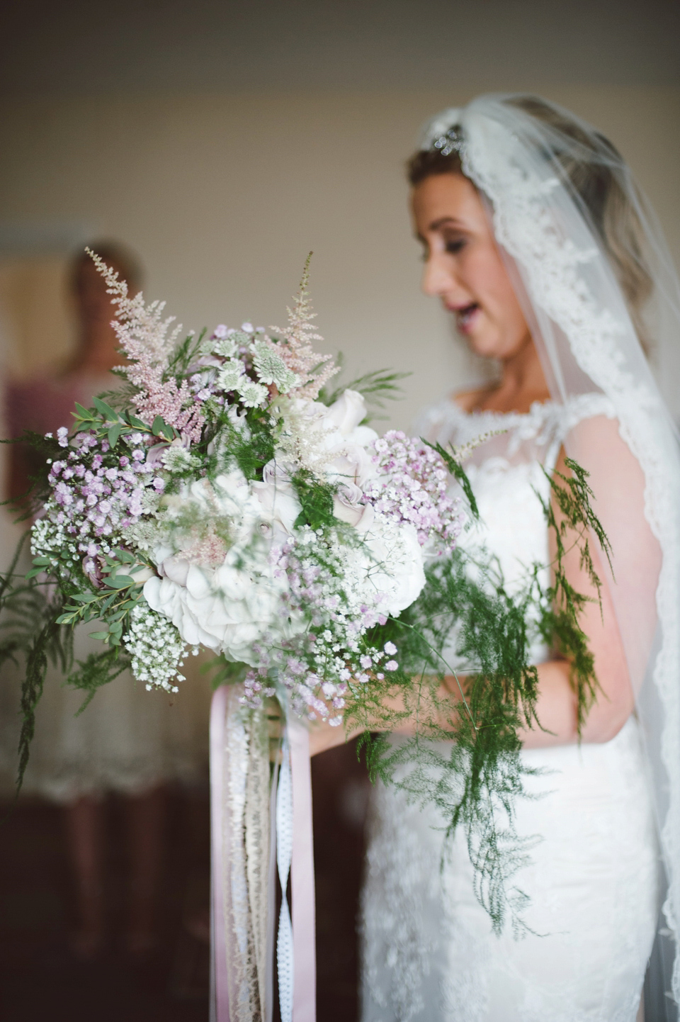 A joy filled barn wedding in shades of gold and pink, with a beautiful bride in a Stella York gown. Images by Mustard Yellow Photography.