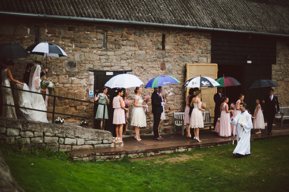 A joy filled barn wedding in shades of gold and pink, with a beautiful bride in a Stella York gown. Images by Mustard Yellow Photography.