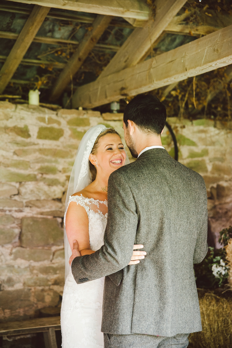 A joy filled barn wedding in shades of gold and pink, with a beautiful bride in a Stella York gown. Images by Mustard Yellow Photography.