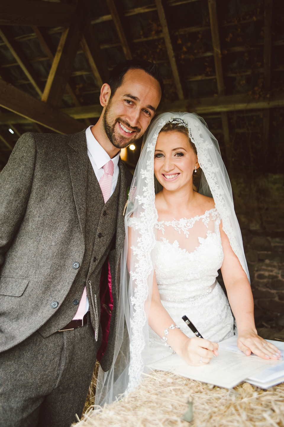 A joy filled barn wedding in shades of gold and pink, with a beautiful bride in a Stella York gown. Images by Mustard Yellow Photography.