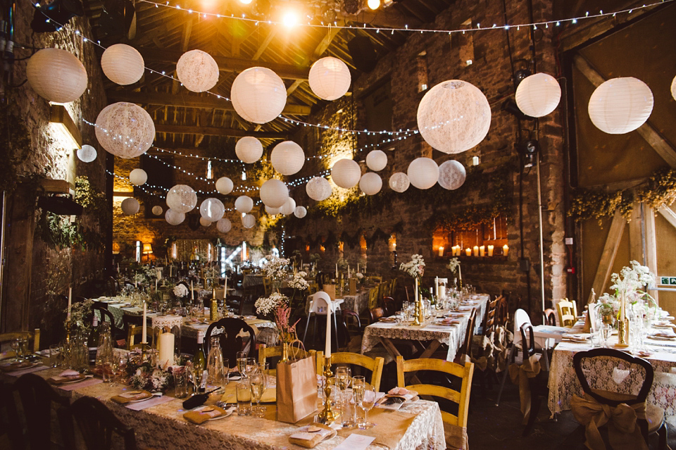 A joy filled barn wedding in shades of gold and pink, with a beautiful bride in a Stella York gown. Images by Mustard Yellow Photography.