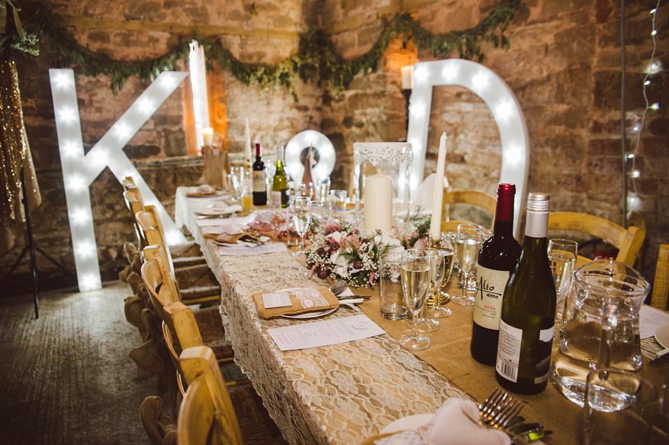 A joy filled barn wedding in shades of gold and pink, with a beautiful bride in a Stella York gown. Images by Mustard Yellow Photography.