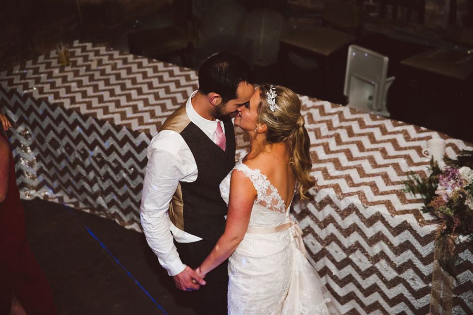 A joy filled barn wedding in shades of gold and pink, with a beautiful bride in a Stella York gown. Images by Mustard Yellow Photography.