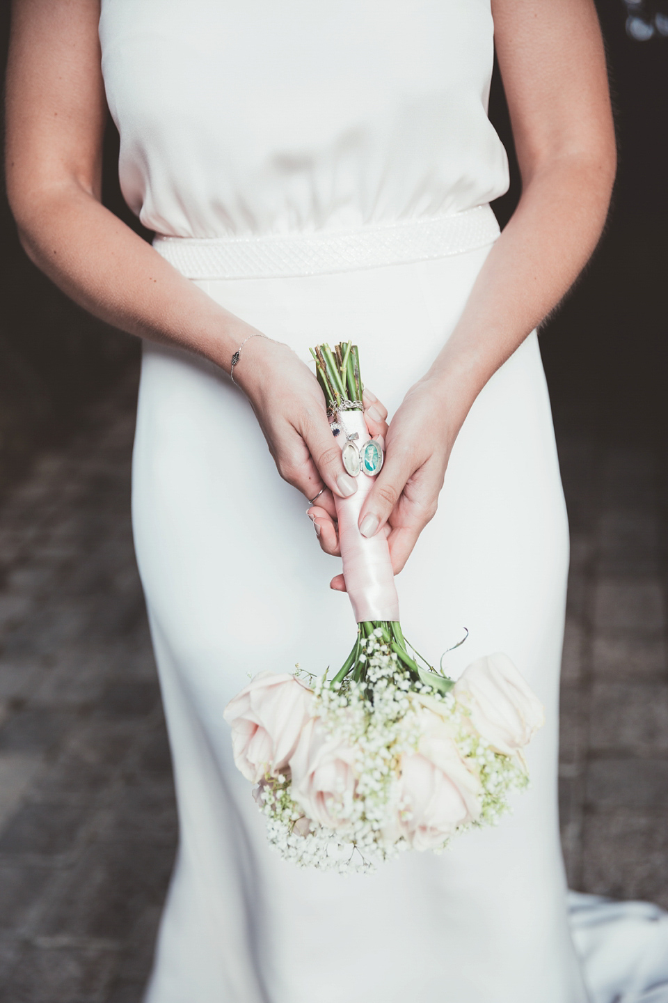 Charlotte wears a Charlotte Simpson gown for her wedding by the sea in Devon. Photography by Philippa James.