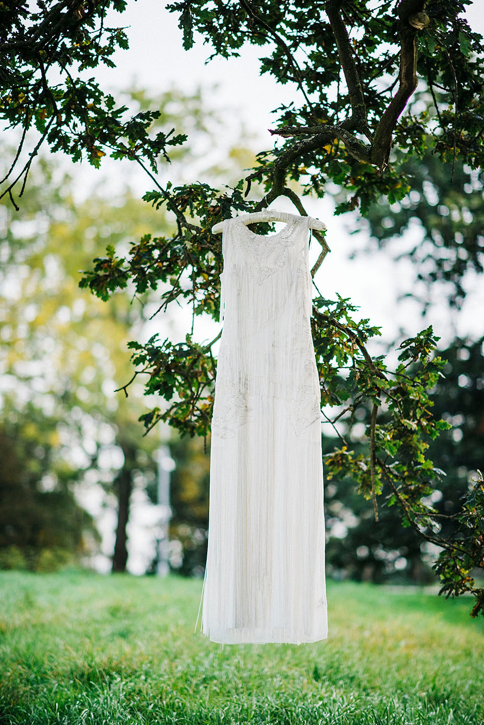 Hayley wore a 1920s tasseled dress by Phase Eight for her Autumn Wedding. Photography by Kerry Woods.