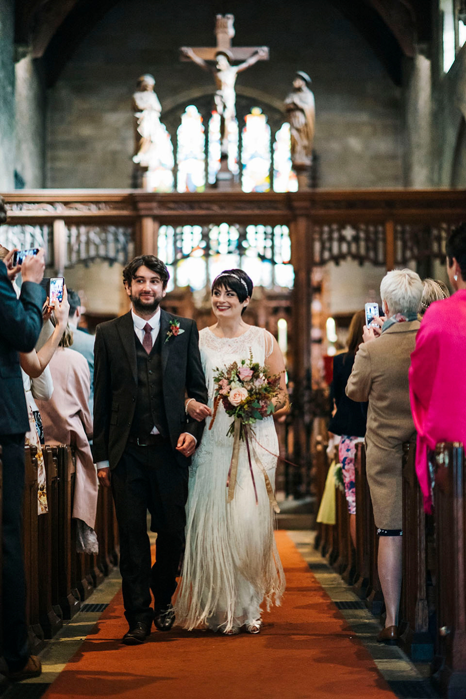 Hayley wore a 1920s tasseled dress by Phase Eight for her Autumn Wedding. Photography by Kerry Woods.