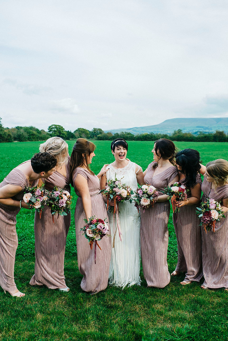 Hayley wore a 1920s tasseled dress by Phase Eight for her Autumn Wedding. Photography by Kerry Woods.