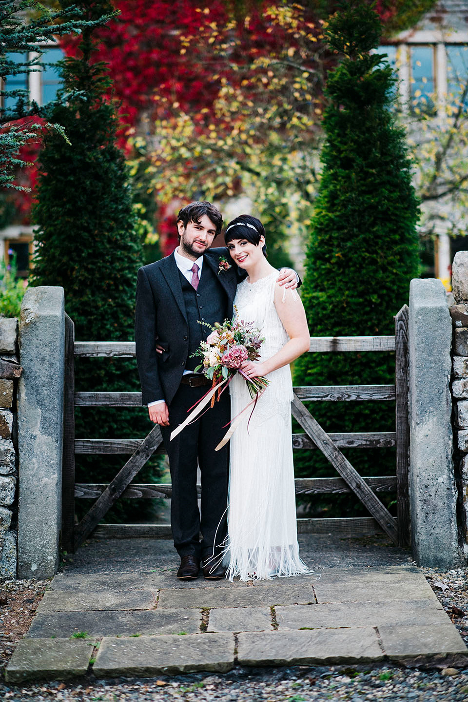 Hayley wore a 1920s tasseled dress by Phase Eight for her Autumn Wedding. Photography by Kerry Woods.