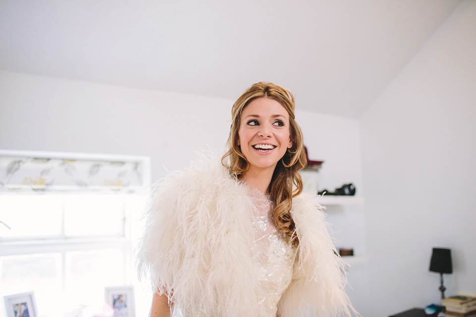 Laura wears 'Mimosa' by Jenny Packham for her winter wedding on the family farm in York. Photography by Kate Gray.