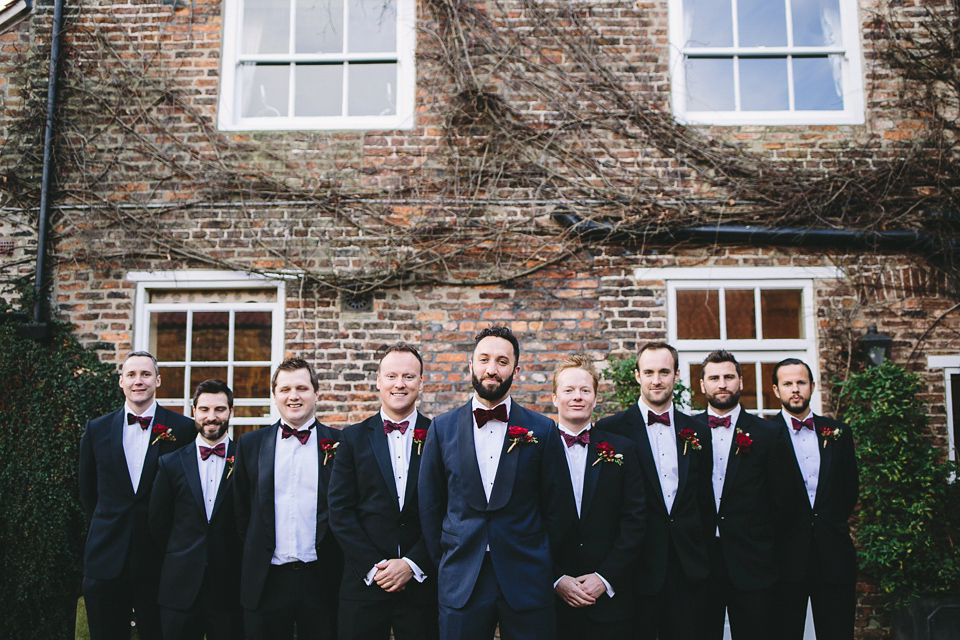 Laura wears 'Mimosa' by Jenny Packham for her winter wedding on the family farm in York. Photography by Kate Gray.