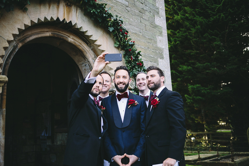 Laura wears 'Mimosa' by Jenny Packham for her winter wedding on the family farm in York. Photography by Kate Gray.