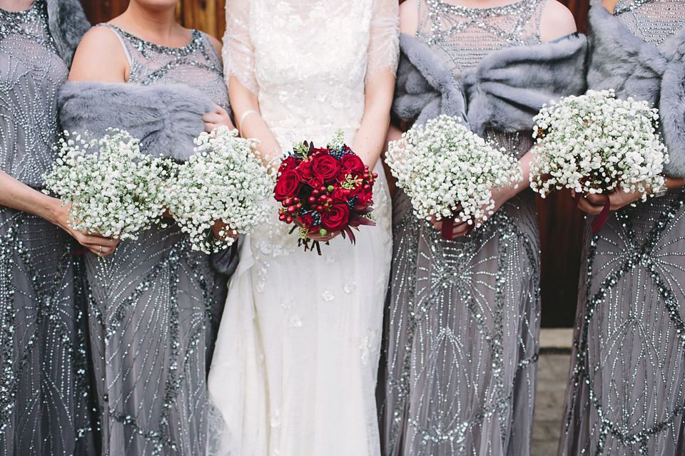 Laura wears 'Mimosa' by Jenny Packham for her winter wedding on the family farm in York. Photography by Kate Gray.