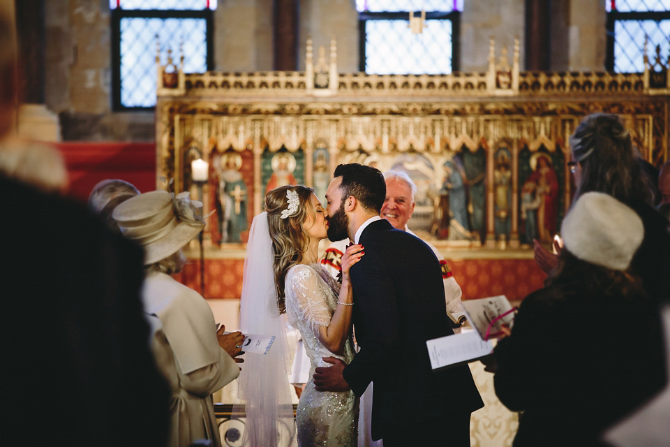 Laura wears 'Mimosa' by Jenny Packham for her winter wedding on the family farm in York. Photography by Kate Gray.