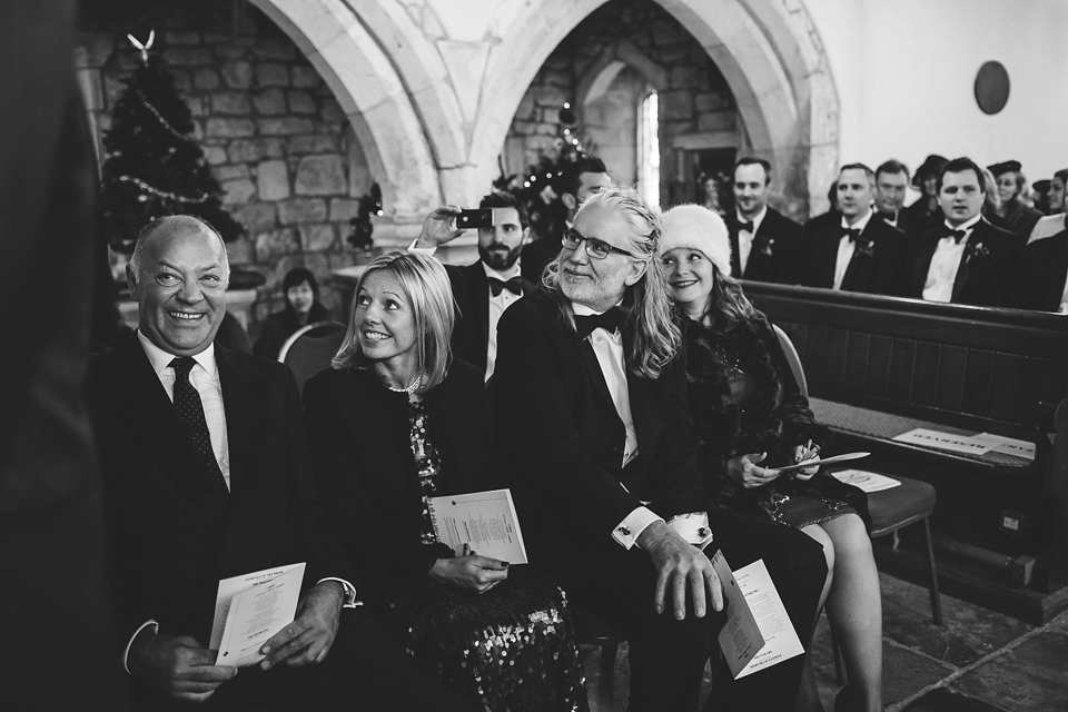 Laura wears 'Mimosa' by Jenny Packham for her winter wedding on the family farm in York. Photography by Kate Gray.